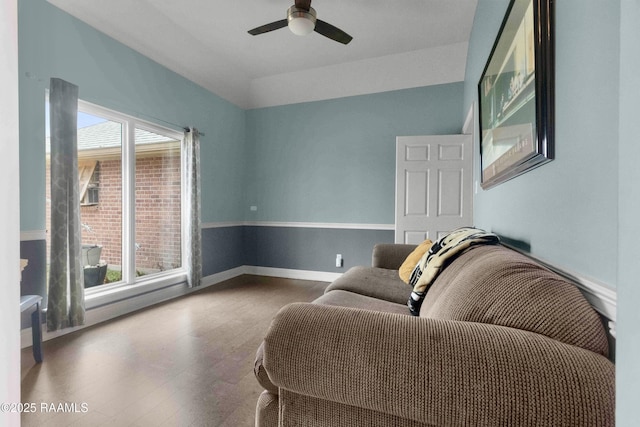 sitting room featuring hardwood / wood-style floors and ceiling fan