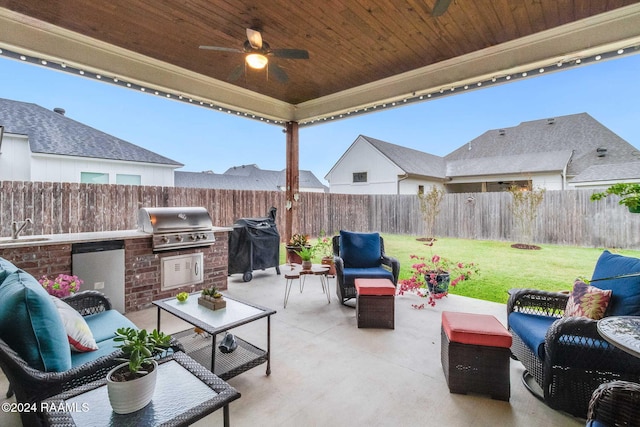 view of patio / terrace with grilling area, exterior kitchen, sink, an outdoor living space, and ceiling fan