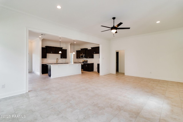 unfurnished living room with ceiling fan and ornamental molding