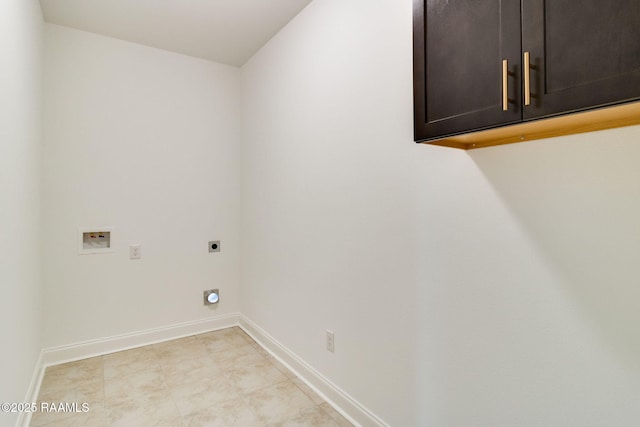 clothes washing area featuring cabinets, washer hookup, and electric dryer hookup