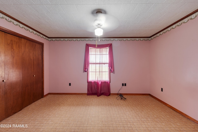 unfurnished bedroom with a closet