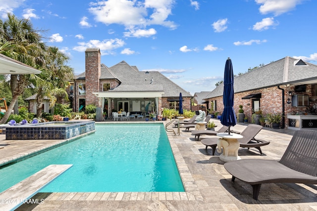 view of pool with a patio area