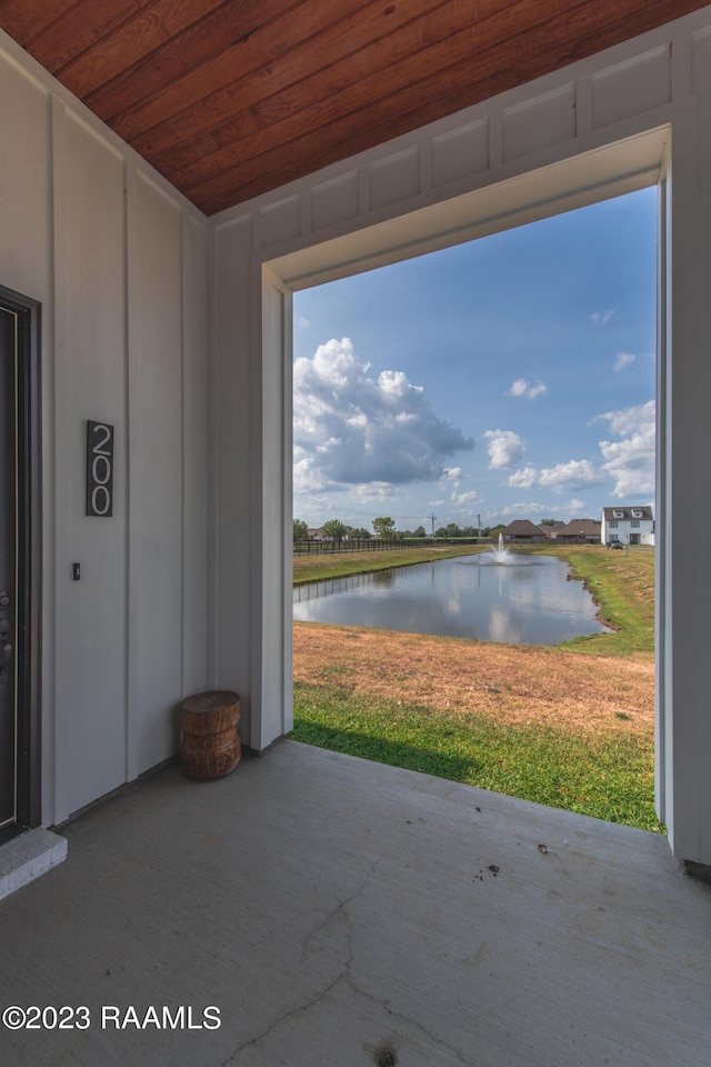 view of patio / terrace featuring a water view