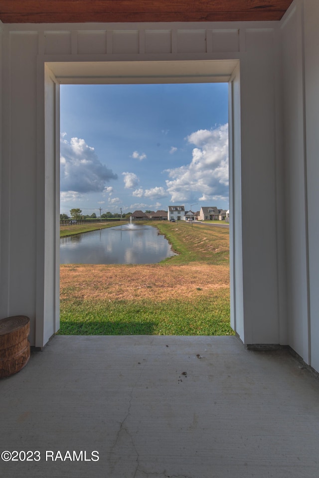 view of patio featuring a water view