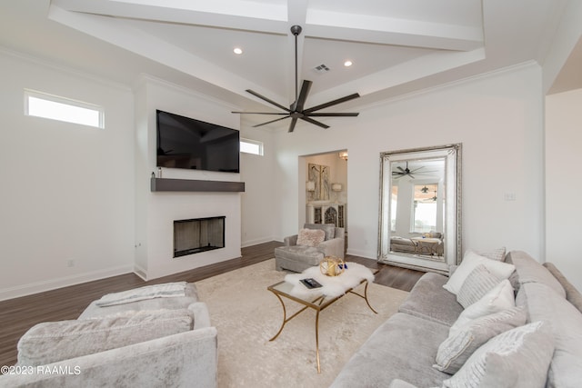 living room with ceiling fan, crown molding, and dark hardwood / wood-style flooring