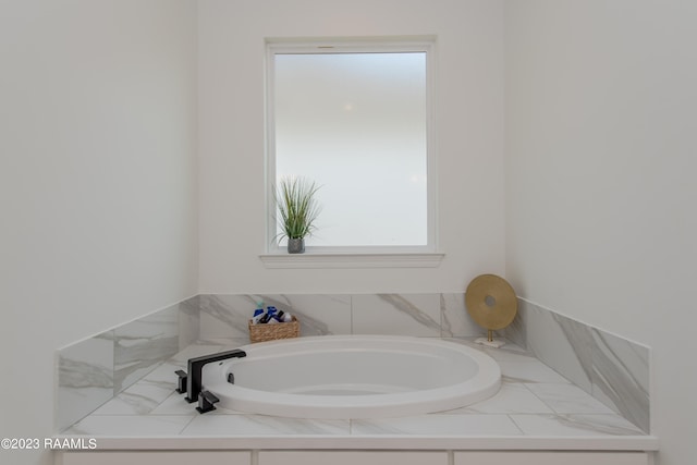 bathroom with a tub