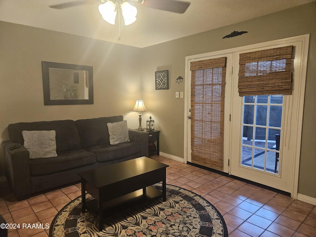 1318 Dulles Dr Unit B, Lafayette, LA 70506 - living room with tile patterned floors and a ceiling fan