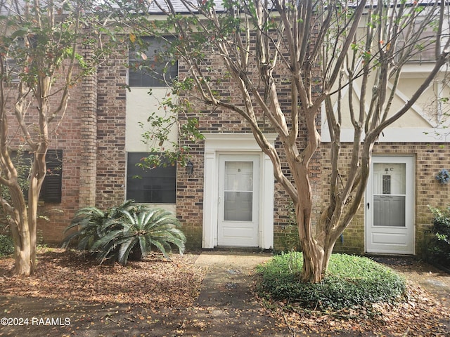 1318 Dulles Dr Unit B, Lafayette, LA 70506 - property entrance featuring brick siding