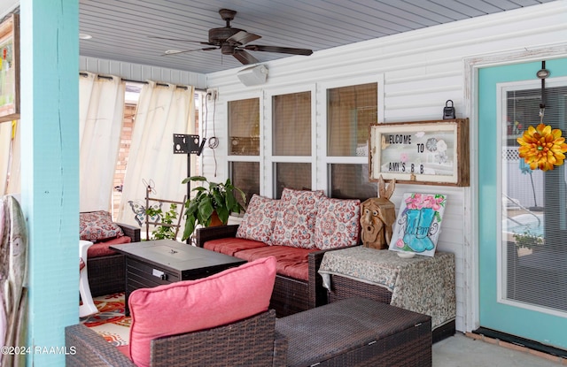 view of patio / terrace featuring ceiling fan