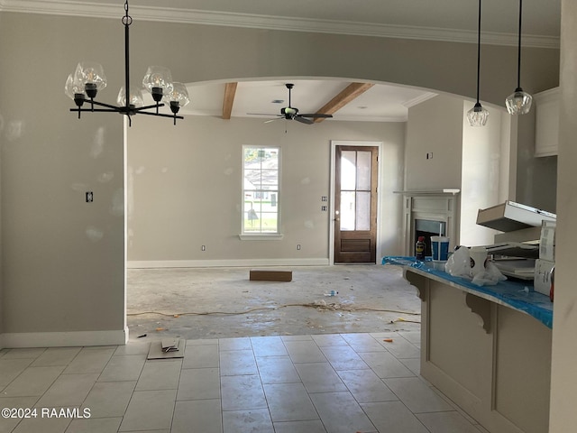 kitchen with ceiling fan with notable chandelier, crown molding, beamed ceiling, decorative light fixtures, and a breakfast bar area