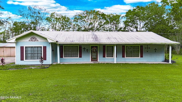 ranch-style house with a front yard