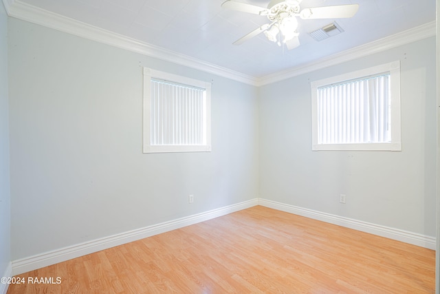 unfurnished room featuring ceiling fan, light hardwood / wood-style floors, and ornamental molding