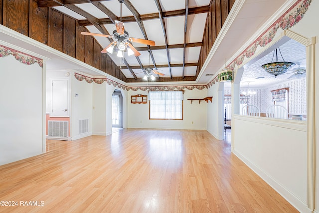 interior space with beam ceiling, light hardwood / wood-style flooring, high vaulted ceiling, and ceiling fan with notable chandelier