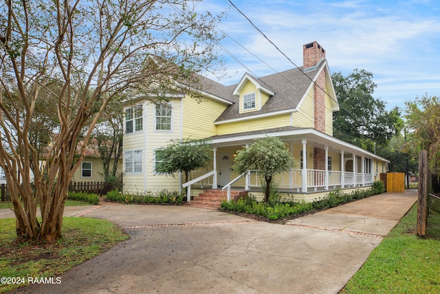 view of front of home featuring covered porch