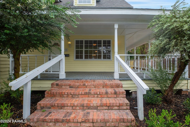 entrance to property with a porch