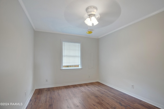 unfurnished room with dark hardwood / wood-style floors, crown molding, and ceiling fan