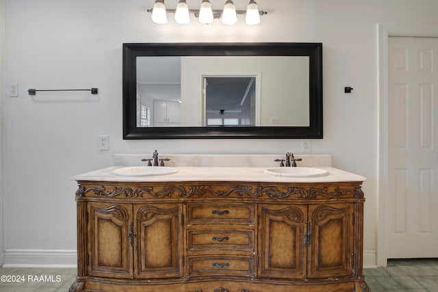 bathroom with vanity and tile patterned flooring