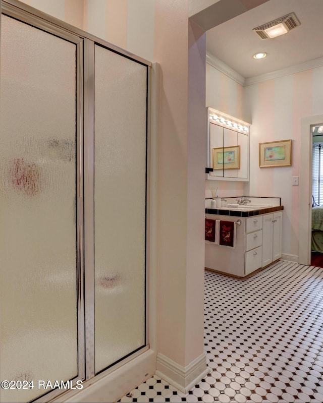 1015 Lee Ave, Lafayette, LA 70501 - bathroom with baseboards, crown molding, a stall shower, vanity, and recessed lighting