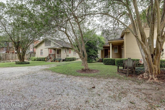 1015 Lee Ave, Lafayette, LA 70501 - obstructed view of property featuring a front yard