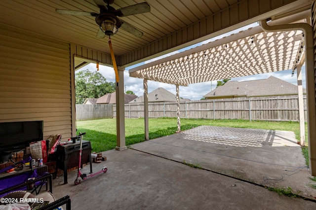 view of patio featuring ceiling fan