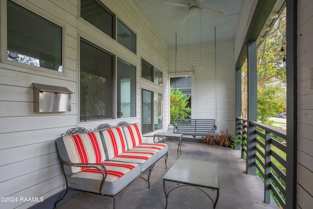 view of patio / terrace with ceiling fan and a porch