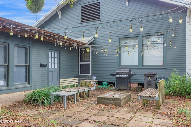 rear view of house with a patio