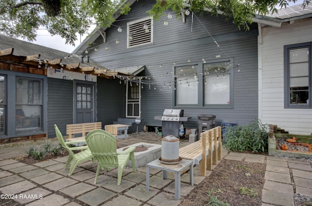 228 Cherry St, Lafayette, LA 70506 - view of patio featuring grilling area and an outdoor fire pit