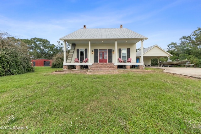 view of front of property with a porch and a front yard