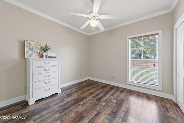 unfurnished bedroom featuring dark hardwood / wood-style floors, ceiling fan, and ornamental molding