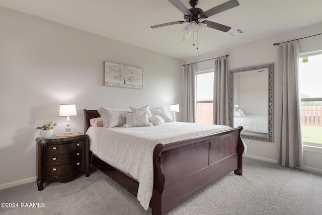 122 Cainwood Ct, Carencro, LA 70520 - bedroom with light carpet, baseboards, and ceiling fan