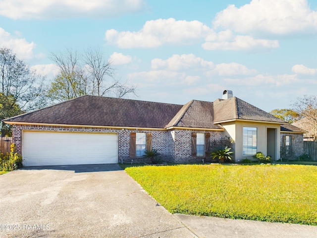 single story home featuring a front lawn and a garage