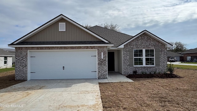 view of front of property with a garage