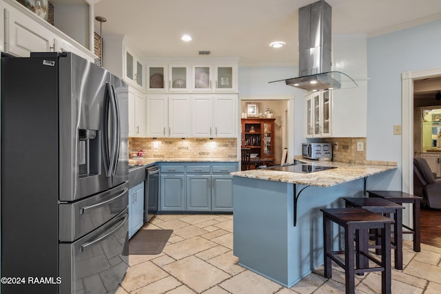 kitchen featuring white cabinets, stainless steel refrigerator with ice dispenser, kitchen peninsula, island exhaust hood, and crown molding