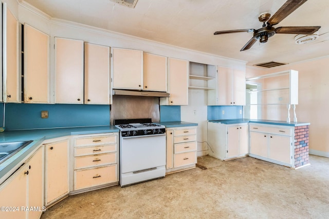 kitchen featuring ornamental molding, white range with gas stovetop, and ceiling fan