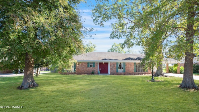 view of front of home with a front yard