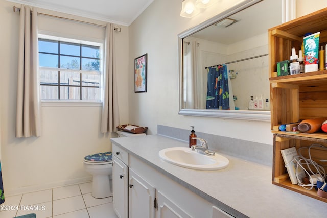 bathroom featuring curtained shower, tile patterned floors, crown molding, toilet, and vanity