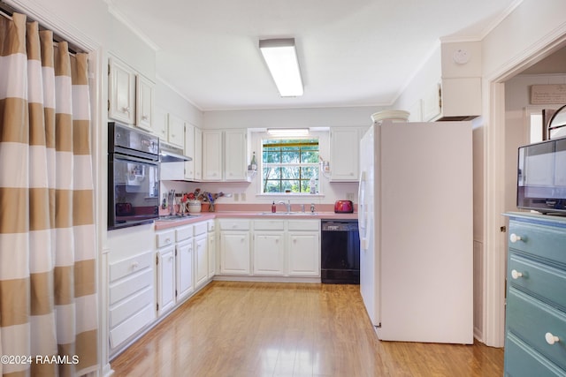 kitchen featuring sink, light hardwood / wood-style flooring, crown molding, white cabinets, and black appliances