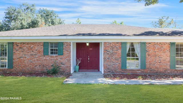 exterior space featuring a front lawn