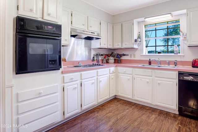 kitchen featuring black appliances, dark hardwood / wood-style flooring, white cabinets, and sink