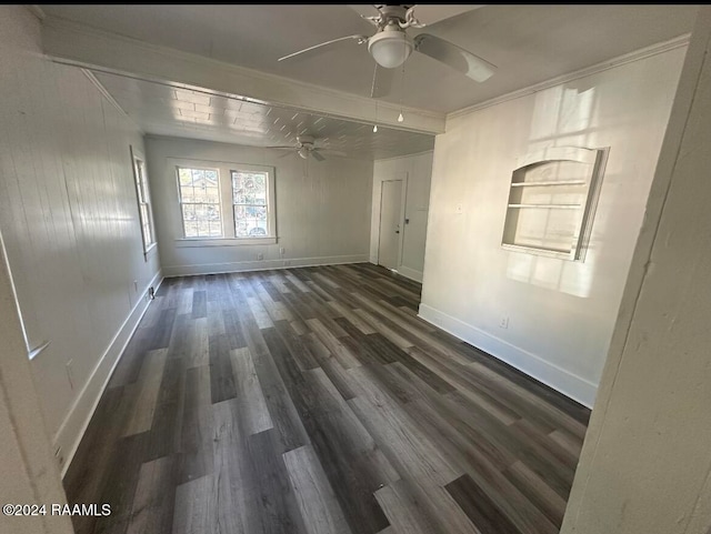 unfurnished room featuring crown molding, ceiling fan, and dark wood-type flooring