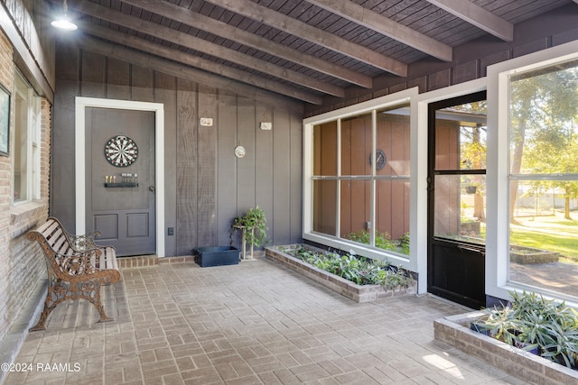 entrance to property with a porch