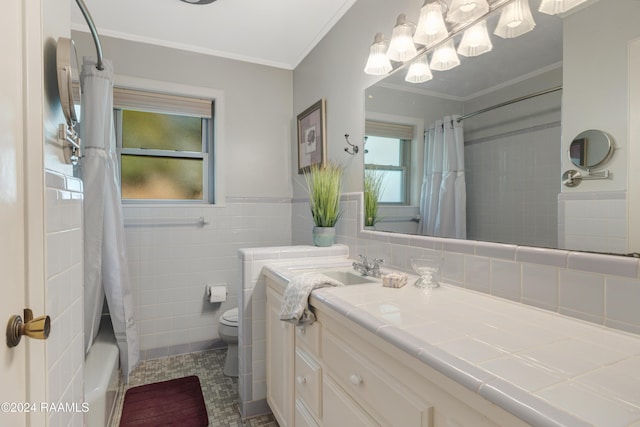 4106 Walnut Dr, New Iberia, LA 70563 - full bath with toilet, vanity, ornamental molding, tile patterned flooring, and tile walls