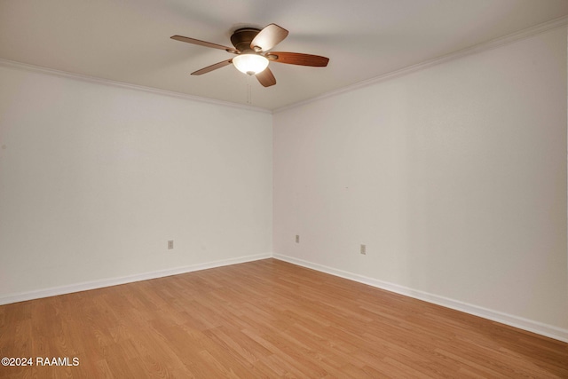 unfurnished room featuring hardwood / wood-style floors, ceiling fan, and ornamental molding