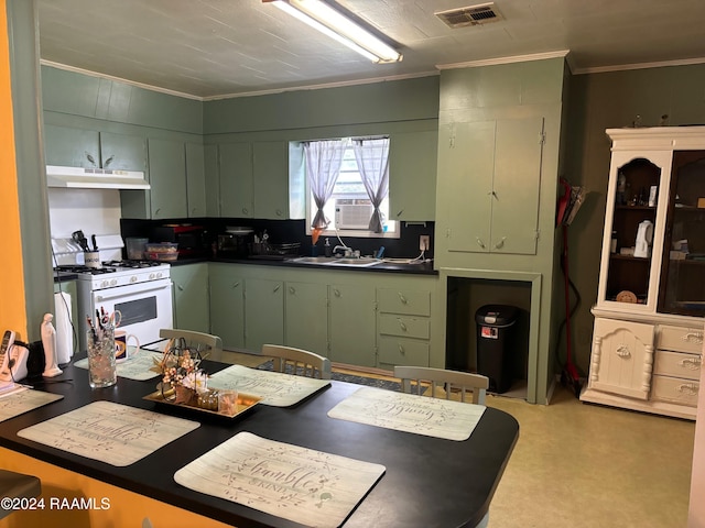 kitchen featuring sink, white gas stove, green cabinetry, cooling unit, and ornamental molding