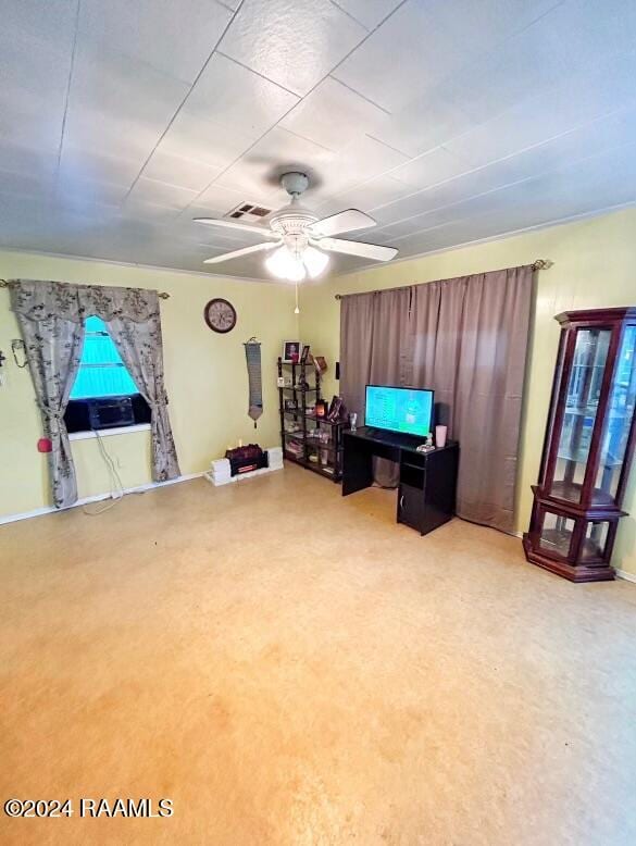 living room featuring ceiling fan