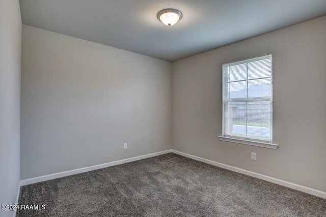 empty room featuring carpet flooring