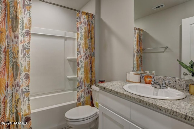 full bathroom featuring vanity, toilet, and shower / bath combination with curtain