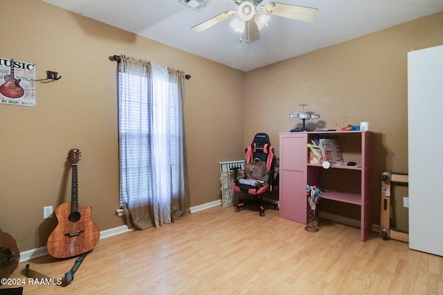 miscellaneous room with hardwood / wood-style floors and ceiling fan