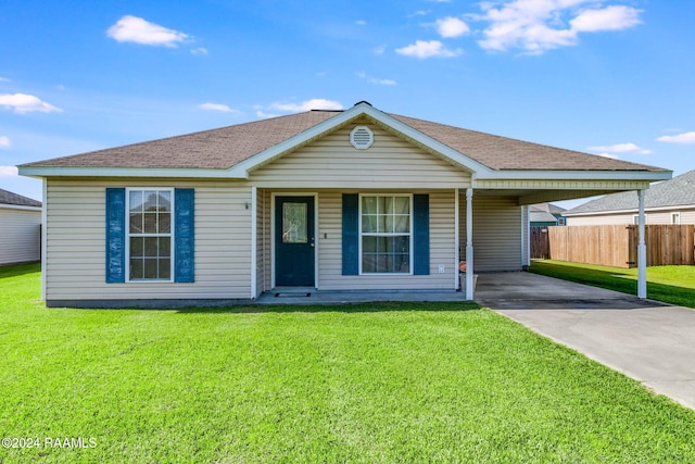 single story home with a front yard and a carport