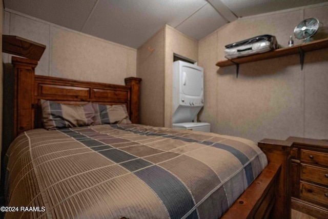 bedroom featuring vaulted ceiling